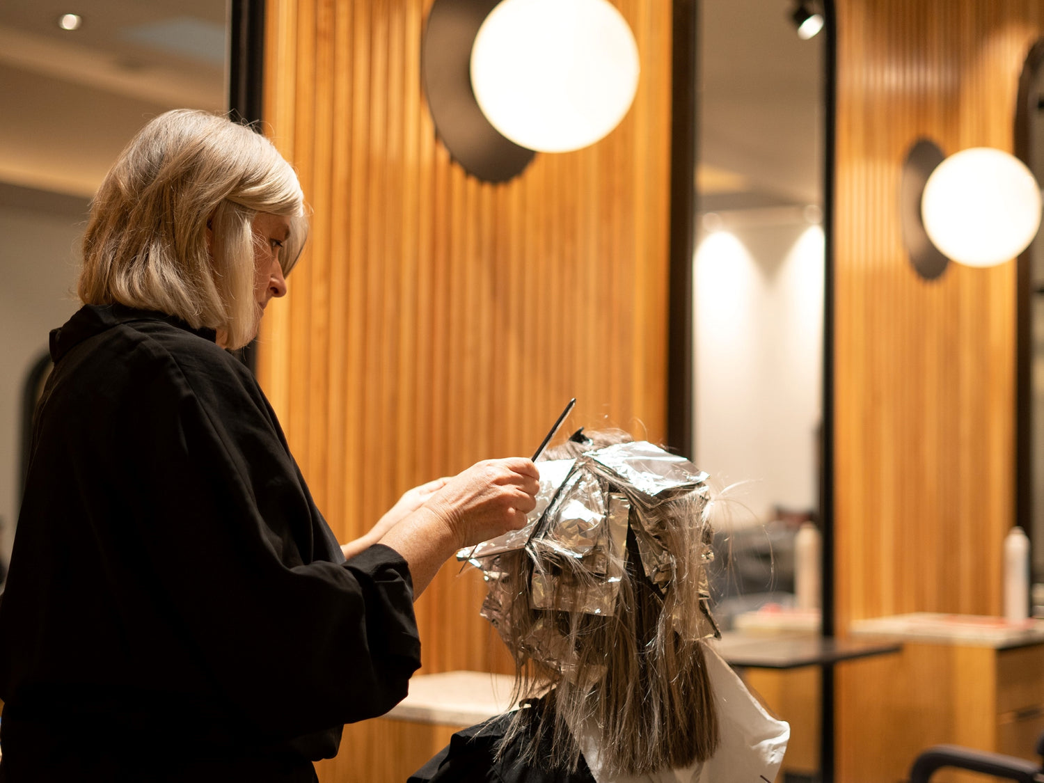 Applying highlights in Castle Street salon