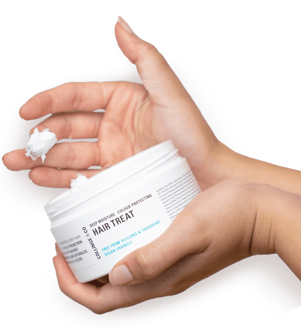 Hair Treat product in someones hand