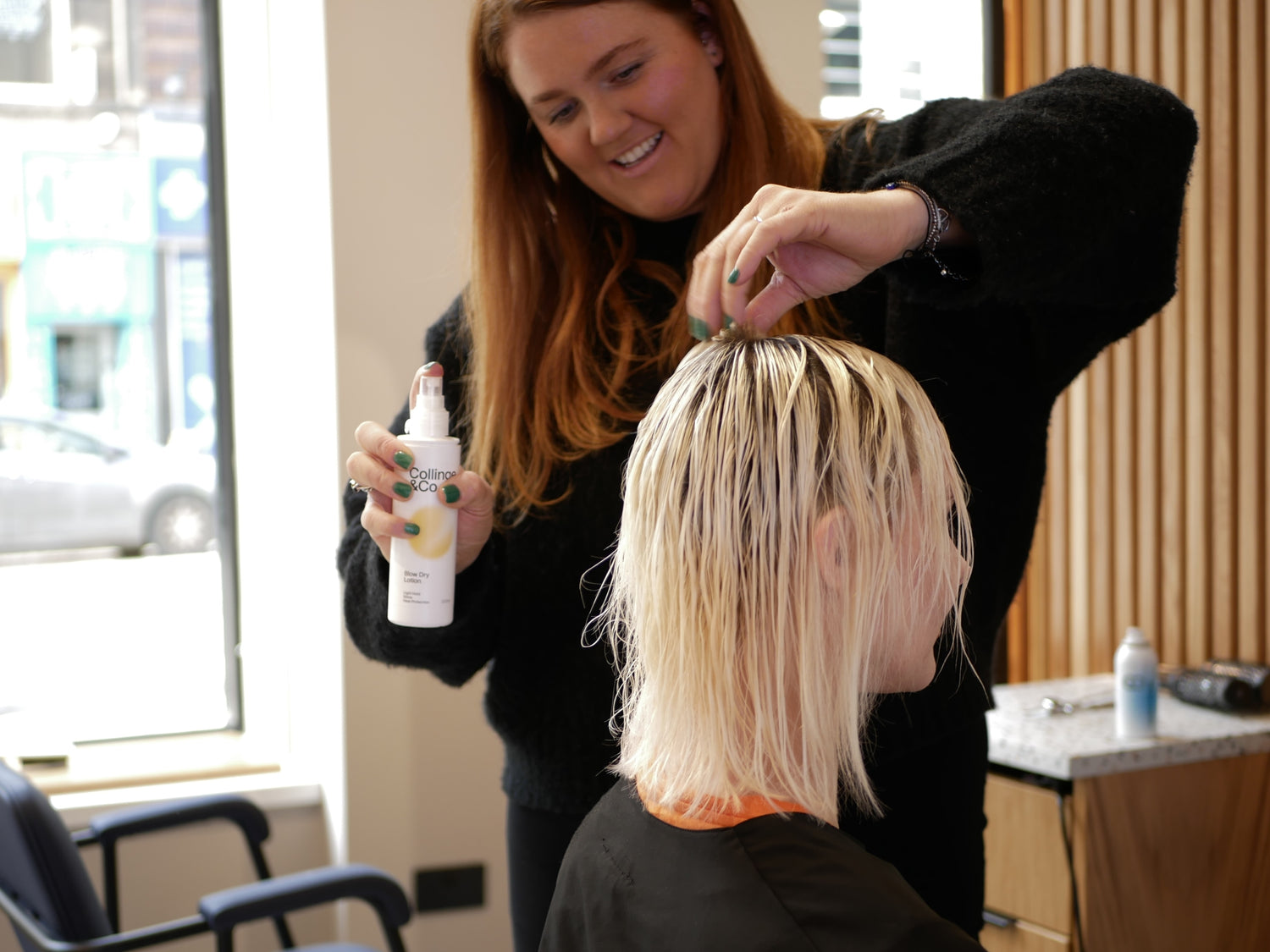 Applying Collinge & Co Blow Dry Lotion